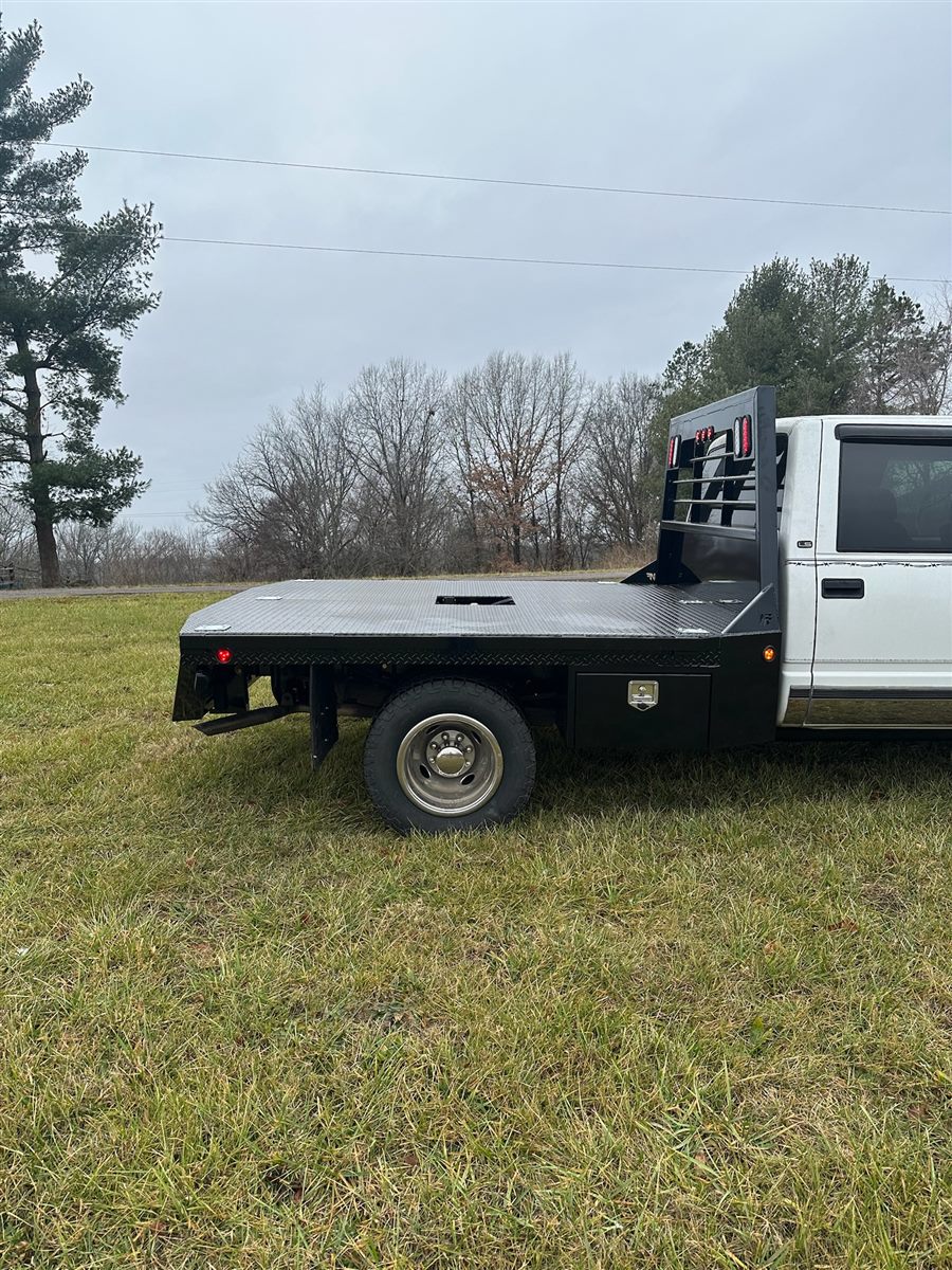 Flatbed and headache rack from the passenger side