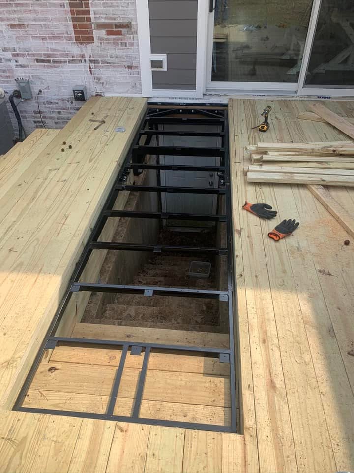 Steel hatch frame set into the deck during the build