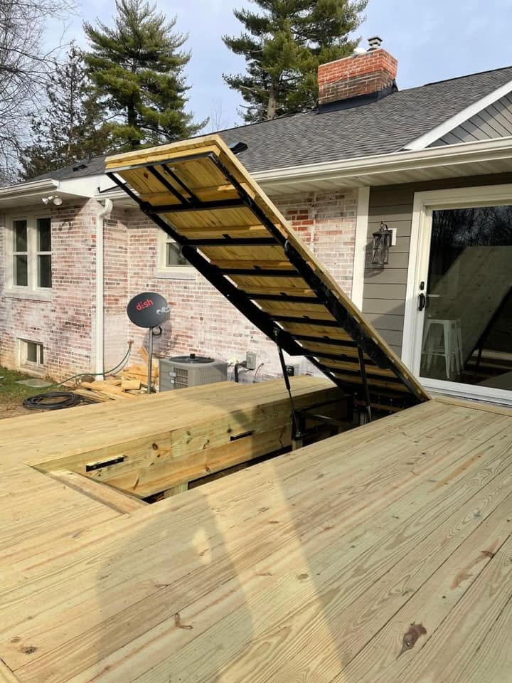Hidden deck staircase with the hatch lifted open
