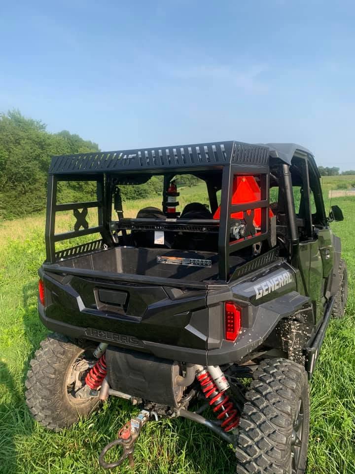 Rear view of the black cargo rack on a Polaris General