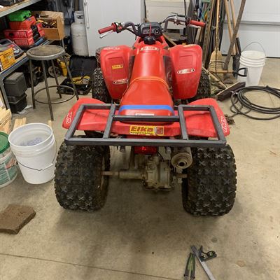 Custom rack on a red ATV
