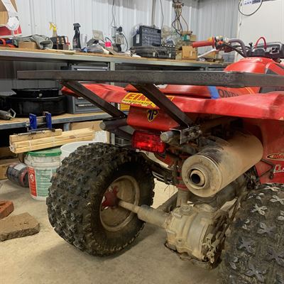 Custom rack mounted on an ATV