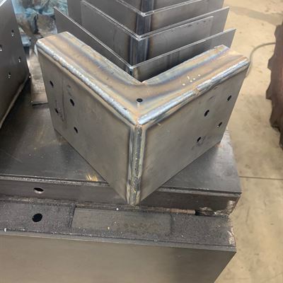 Stack of welded steel corner brackets