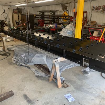 Long steel beams finished in the shop