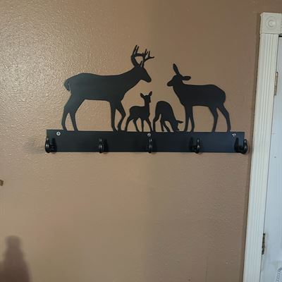 Deer family coat rack with hooks