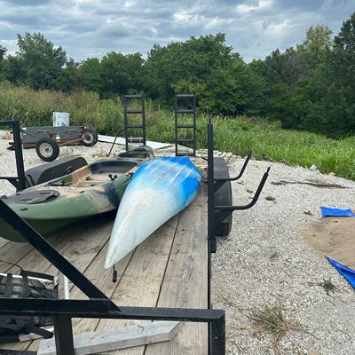 Kayaks loaded on the custom trailer racks