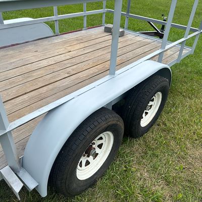 Finished rebuilt trailer with gray rails